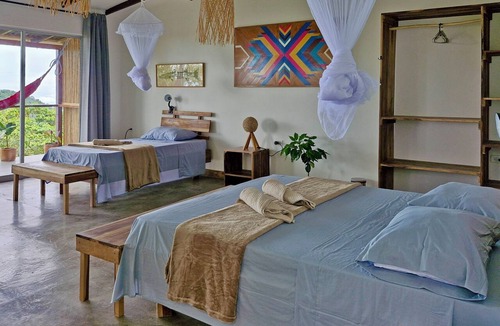 Minca Hotel | Private ocean view room on Minca Sintropia sustainable lodge & coffee finca