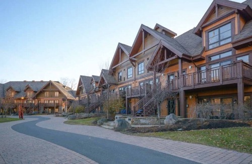 Versant Soleil Ski Chalet | SPECTACULAR SKI IN - SKI OUT Golf Hiking Biking Casino Chalet in Mont Tremblant