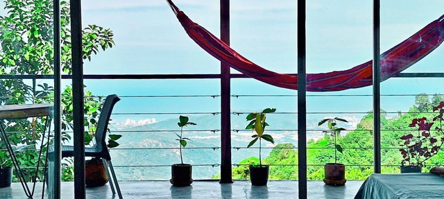 Private ocean view room on Minca Sintropia sustainable lodge & coffee finca in Minca